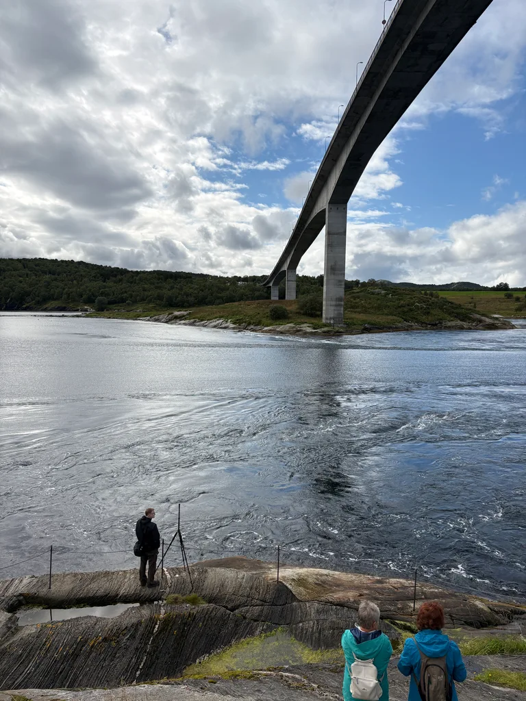 The strong current happens under the bridge when the fjord flow into the ocean