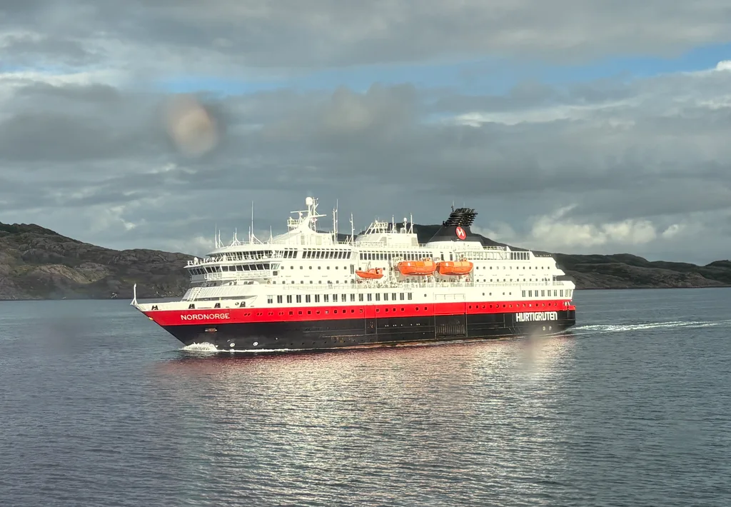 Whenever there was a ship crossing, the captain would blow our horn.  Our room is on the left side of the ship and they all pass by our window.